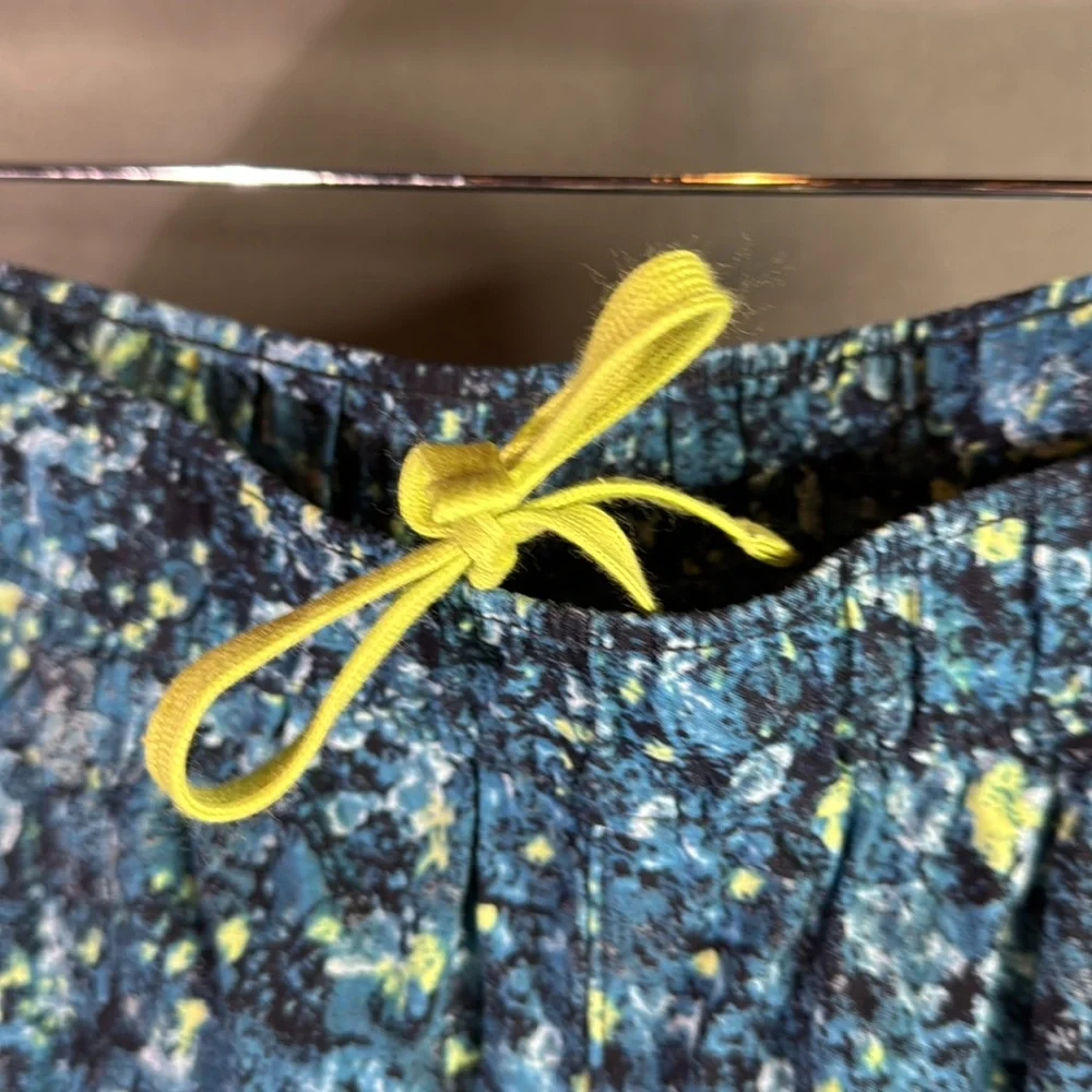 The North Face Blue and Yellow Athletic Shorts size medium‎